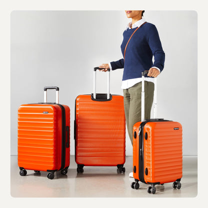 AMAZON BASICS hard-shell travel suitcase set (3 pieces): Orange 